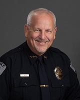 Photograph of Chief Jon Weiks in uniform.